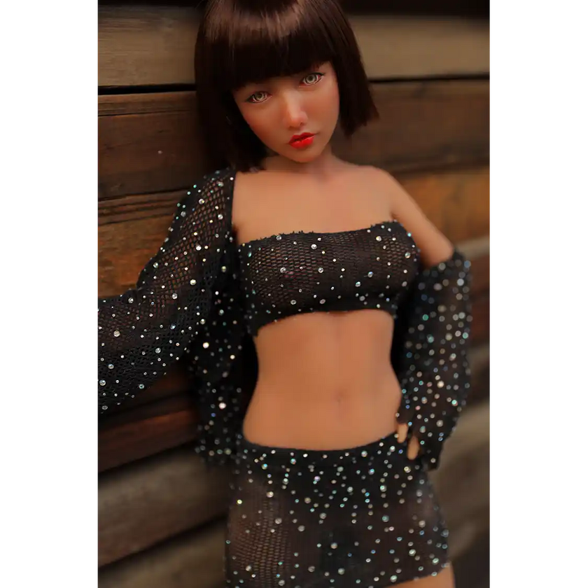 1ft 11in 60cm lifelike mini silicone sex doll with brown hair, slim athletic body and medium breasts.