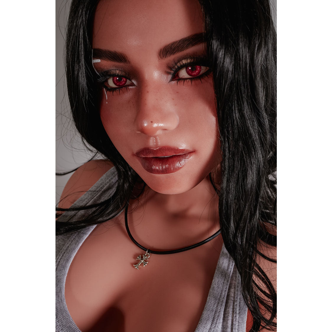 Reese 154 cm Latina hybrid E-cup sex doll in grey tank top kneeling on dark floor – Climax Collection