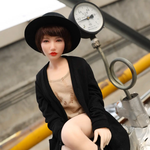 1ft 11in 60cm Asian female TPE sex doll with brown hair, brown eyes small breasts and a slim athletic figure.
