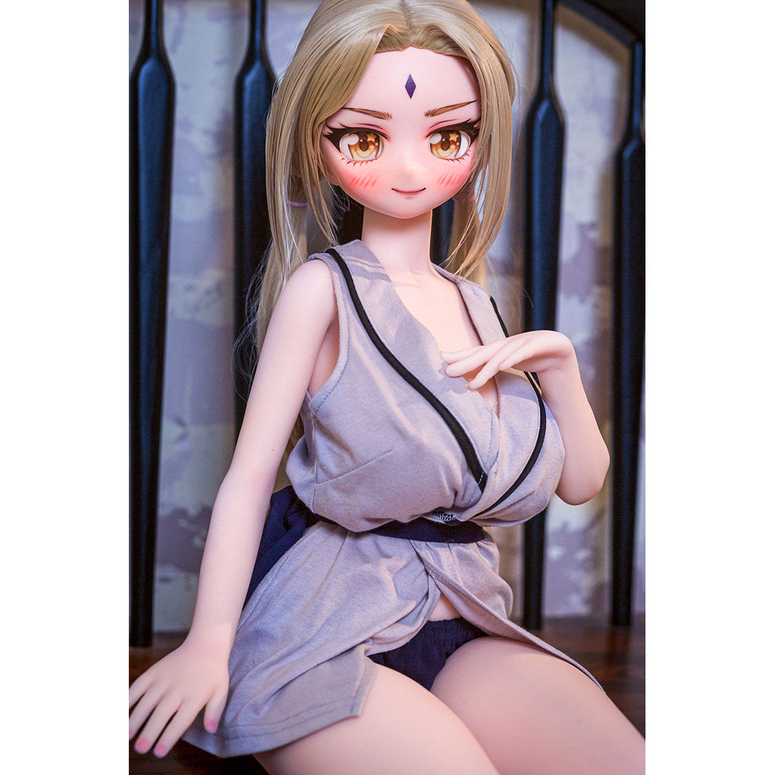 2ft 9in or 85cm tall mini anime sex doll Reyna. Silicone body construction, large breasts, fair skin, jaw length blonde hair and a slim athletic body in a sexy Asian style fantasy outfit.