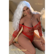 5ft 2in 157cm curvy sex doll with long wavy silver hair, tan skin, and large E-cup breasts in red fishnet lingerie.Made by 6ye.