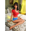 5ft 6in 166cm slim Asian TPE sex doll with shoulder length black hair, small breasts and brown eyes in a red shirt and blue shorts.