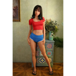 5ft 6in 166cm slim Asian TPE sex doll with shoulder length black hair, small breasts and brown eyes in a red shirt and blue shorts.