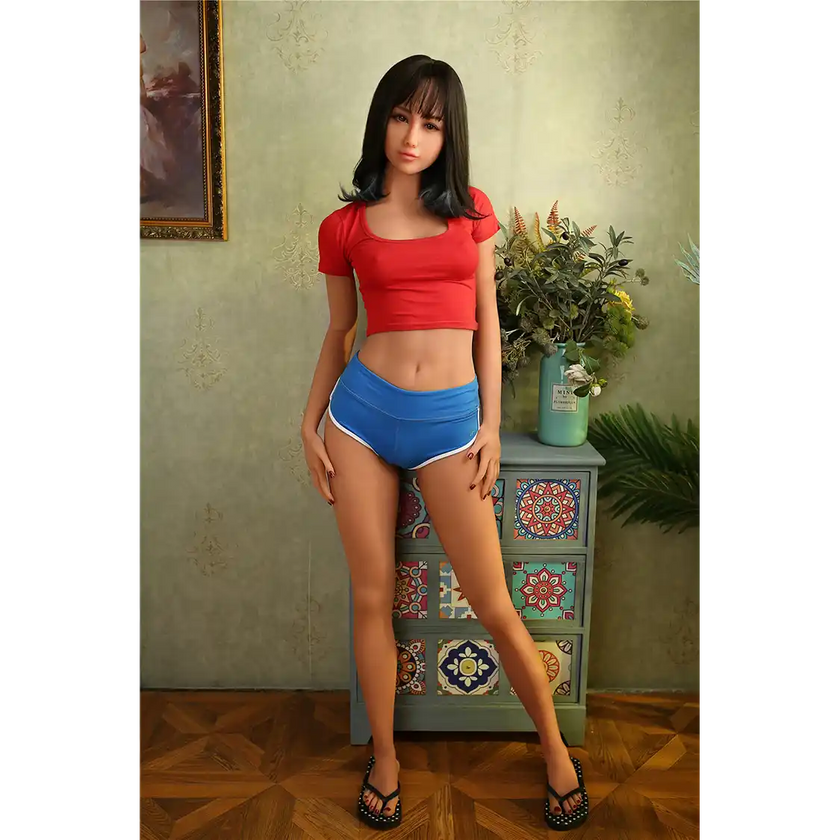 5ft 6in 166cm slim Asian TPE sex doll with shoulder length black hair, small breasts and brown eyes in a red shirt and blue shorts.