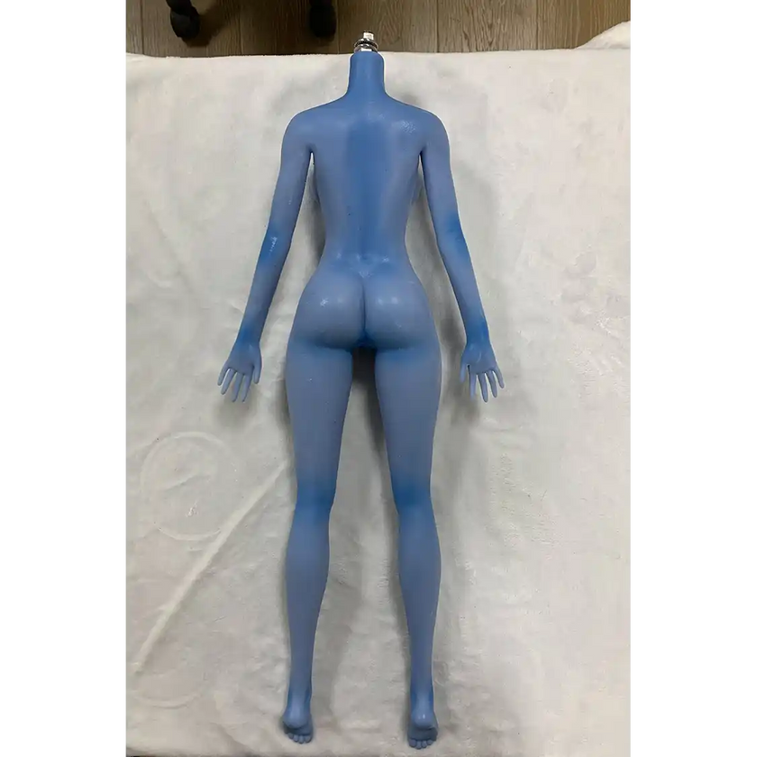 2ft 60cm anime style female mini silicone sex doll with medium breasts, blue skin and a fit athletic body in a sailor moon outfit.