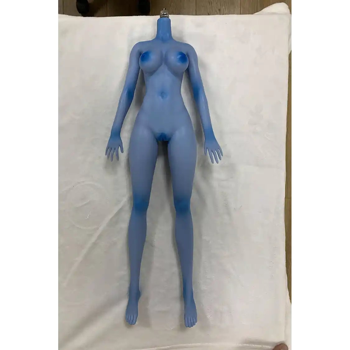 2ft 60cm anime style female mini silicone sex doll with medium breasts, blue skin and a fit athletic body in a sailor moon outfit.