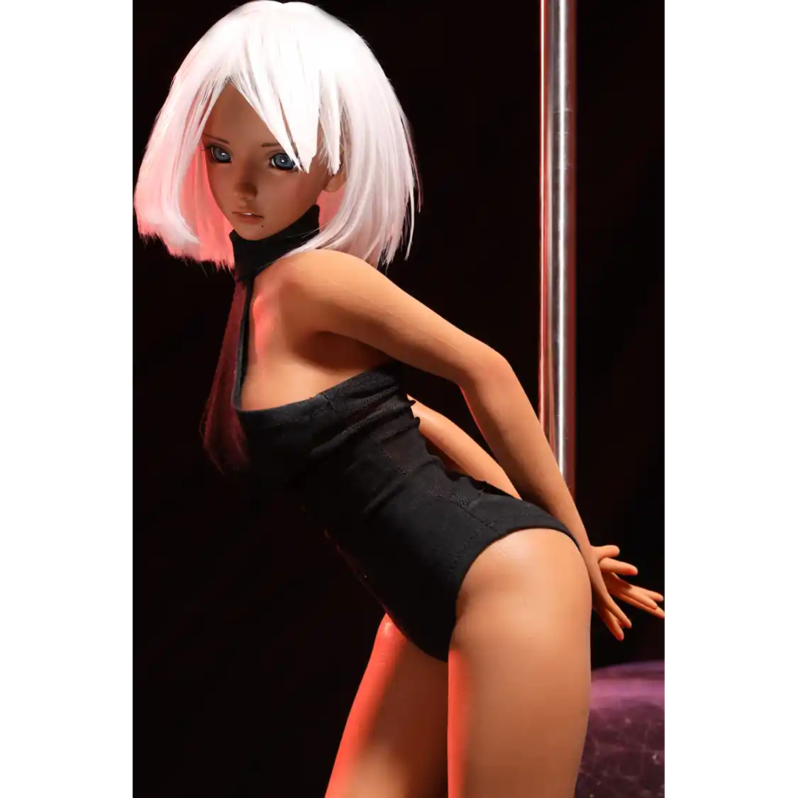 2ft 60cm anime style female mini silicone sex doll with large breasts, tanned skin and a fit athletic body.