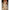3ft 11in or 120cm tall Aiko.  Anime TPE sex doll with large breasts, long red hair, red eyes and a light blue bikini. Made by Irokebijin.