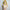 3ft 1in or 95cm tall Akane.  Mini Anime silicone sex doll with large breasts, long blonde hair and a gray and white bikini. Made by Irokebijin.