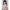 3ft 11in or 120cm tall Aki.  Anime TPE sex doll with large breasts, long dark blue hair, purple eyes and a pink and white bikini. Made by Irokebijin.