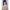 3ft 11in or 120cm tall Aki.  Anime TPE sex doll with large breasts, long dark blue hair, purple eyes and a pink and white bikini. Made by Irokebijin.