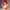 3ft 1in or 95cm tall Aoi.  Mini Anime silicone sex doll with large breasts, long red hair, heart eyes and a tiger striped bikini. Made by Irokebijin.