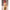 3ft 1in or 95cm tall Aoi.  Mini Anime silicone sex doll with large breasts, long red hair, heart eyes and a tiger striped bikini. Made by Irokebijin.