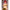 3ft 1in or 95cm tall Aoi.  Mini Anime silicone sex doll with large breasts, long red hair, heart eyes and a tiger striped bikini. Made by Irokebijin.