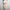 3ft 1in or 95cm tall Rico A.  Mini Anime TPE sex doll with large breasts, long green hair, yellow eyes and a white Irokebijin bikini. Made by Irokebijin.