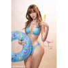5ft 1in 157cm anime style female TPE sex doll by FunWest with brown hair, C-cup breasts and a slim figure in a blue bikini.