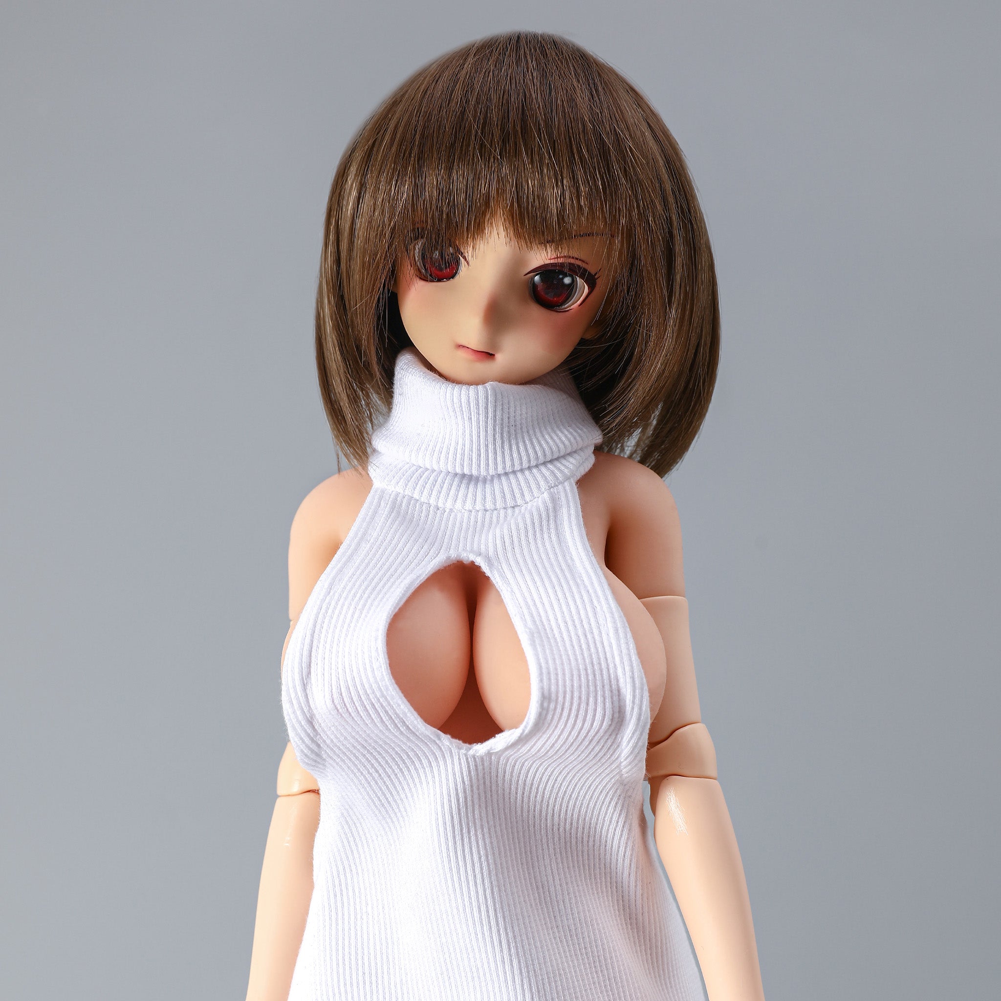 2ft 62cm mini anime sex doll Vanya. Silicone body construction, large breasts, fair skin, short brown hair and a slim athletic body with hard plastic limbs in a sexy white blouse.