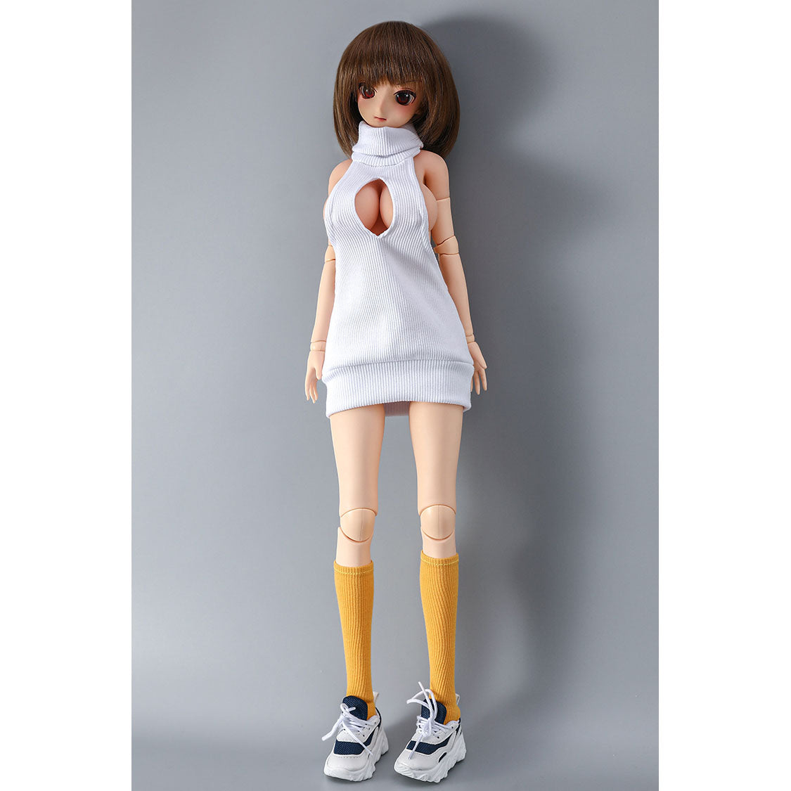 2ft 62cm mini anime sex doll Vanya. Silicone body construction, large breasts, fair skin, short brown hair and a slim athletic body with hard plastic limbs in a sexy white blouse.