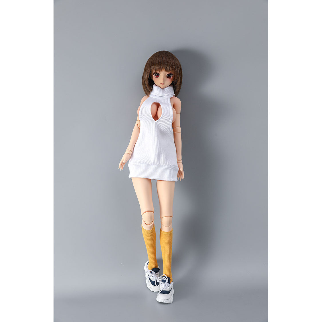 2ft 62cm mini anime sex doll Vanya. Silicone body construction, large breasts, fair skin, short brown hair and a slim athletic body with hard plastic limbs in a sexy white blouse.