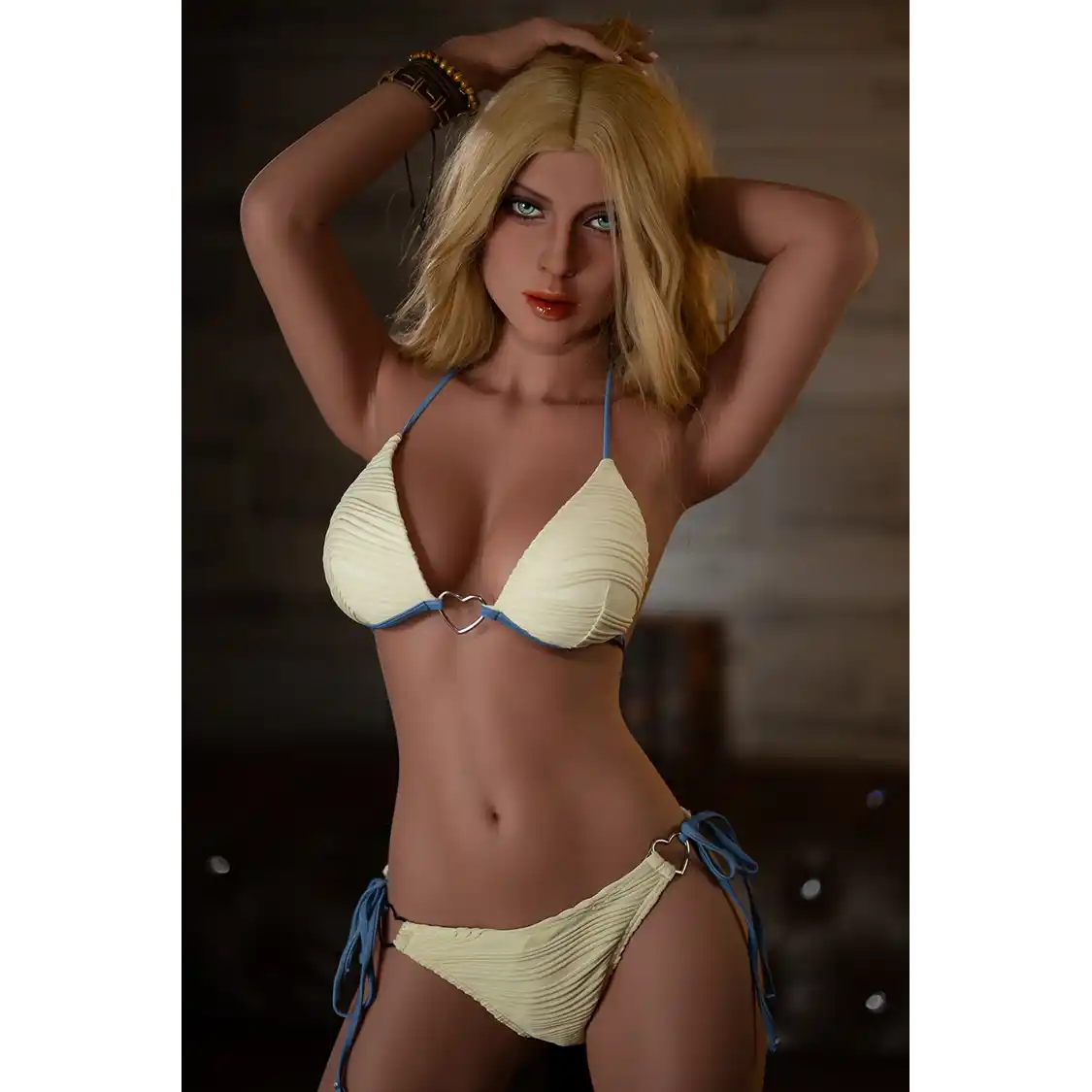 5ft 2in or 157cm lifelike full size medium breast fair skin, skinny hybrid sex doll with blonde hair and blue eyes in a yellow bikini.