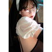 Yeona is a 5ft 4in or 162cm full figured ultra realistic silicone sex doll with long legs, large breasts, curvy figure and long black hair in see through nun outfit.