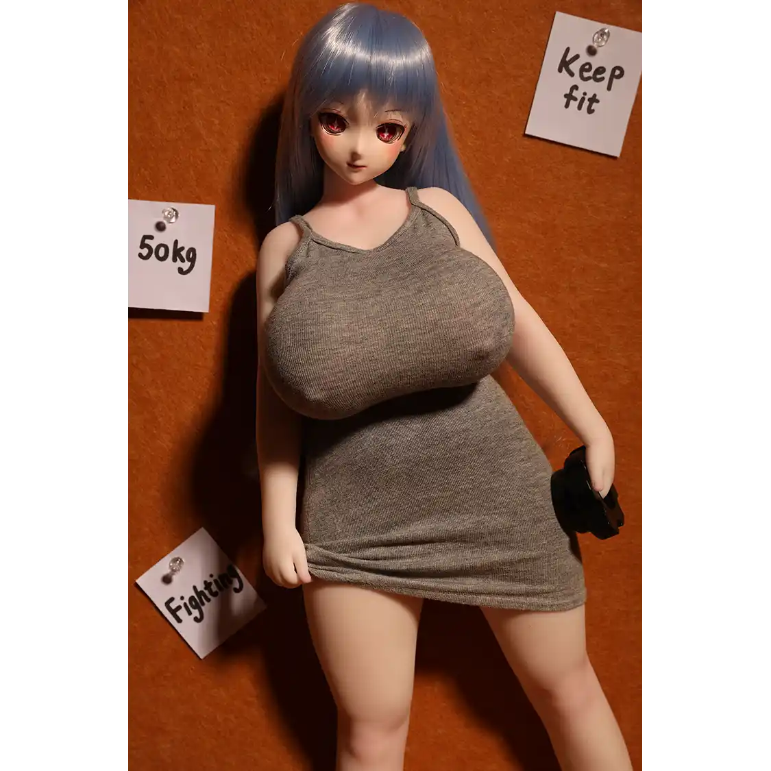 1ft 11in 58cm anime style female mini silicone sex doll with huge breasts, tanned skin and thick curvy body.