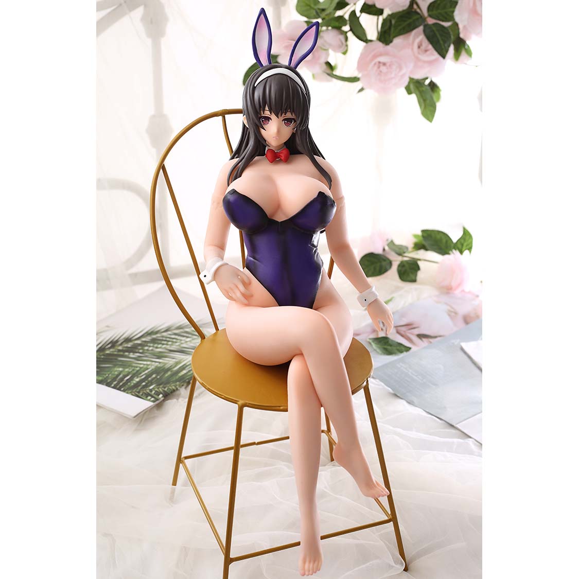 1ft 06in 45cm mini silicone anime sex doll with black hair, light skin and large breasts.