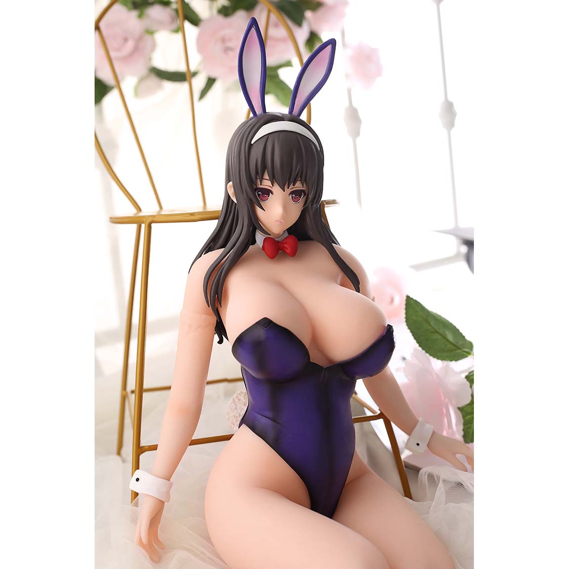 1ft 06in 45cm mini silicone anime sex doll with black hair, light skin and large breasts.