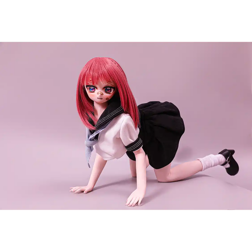 2ft 60cm anime style female mini silicone sex doll with medium breasts, fair skin and a fit athletic body in a school girl outfit.