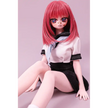 2ft 60cm anime style female mini silicone sex doll with medium breasts, fair skin and a fit athletic body in a school girl outfit.