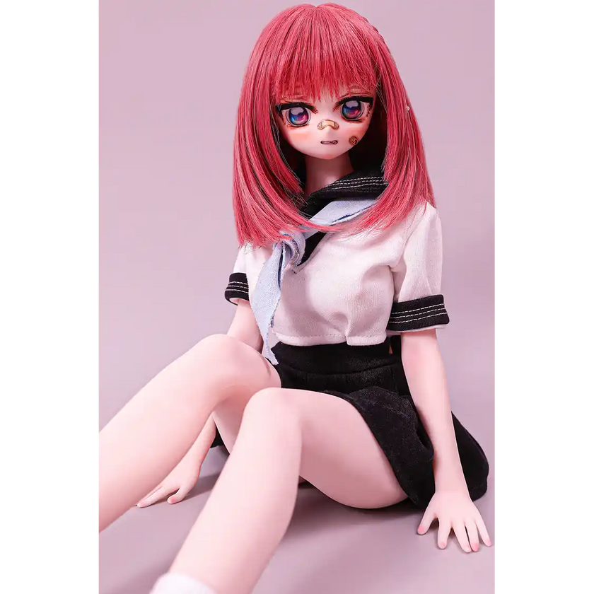 2ft 60cm anime style female mini silicone sex doll with medium breasts, fair skin and a fit athletic body in a school girl outfit.