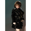 2ft 60cm mini anime sex doll Zella. Silicone body construction, giant breasts, fair skin, short dark hair and a curvy body in a  sheer top, black leather jacket and black skirt.