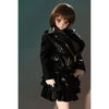 2ft 60cm mini anime sex doll Zella. Silicone body construction, giant breasts, fair skin, short dark hair and a curvy body in a  sheer top, black leather jacket and black skirt.