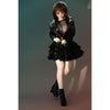 2ft 60cm mini anime sex doll Zella. Silicone body construction, giant breasts, fair skin, short dark hair and a curvy body in a  sheer top, black leather jacket and black skirt.