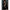2ft 60cm mini anime sex doll Zella. Silicone body construction, giant breasts, fair skin, short dark hair and a curvy body in a  sheer top, black leather jacket and black skirt.