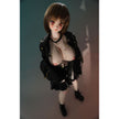 2ft 60cm mini anime sex doll Zella. Silicone body construction, giant breasts, fair skin, short dark hair and a curvy body in a  sheer top, black leather jacket and black skirt.