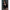 2ft 60cm mini anime sex doll Zella. Silicone body construction, giant breasts, fair skin, short dark hair and a curvy body in a  sheer top, black leather jacket and black skirt.