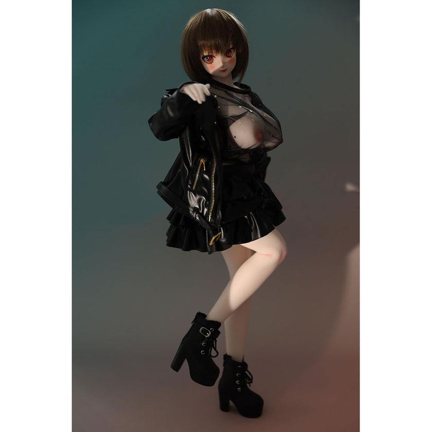 2ft 60cm mini anime sex doll Zella. Silicone body construction, giant breasts, fair skin, short dark hair and a curvy body in a  sheer top, black leather jacket and black skirt.