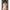 2ft 60cm mini anime sex doll Zella. Silicone body construction, giant breasts, fair skin, short dark hair and a curvy body in a  sheer top, black leather jacket and black skirt.