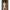 2ft 60cm mini anime sex doll Zella. Silicone body construction, giant breasts, fair skin, short dark hair and a curvy body in a  sheer top, black leather jacket and black skirt.