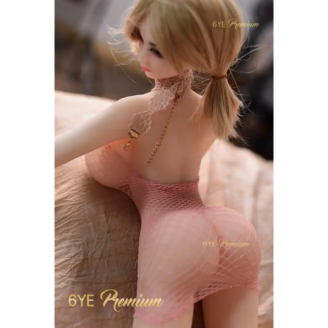 2ft 1in or 65cm big breast mini sex doll with pale skin, long legs, short blonde hair, big butt, and brown eyes in pink lingerie. Made by 6ye