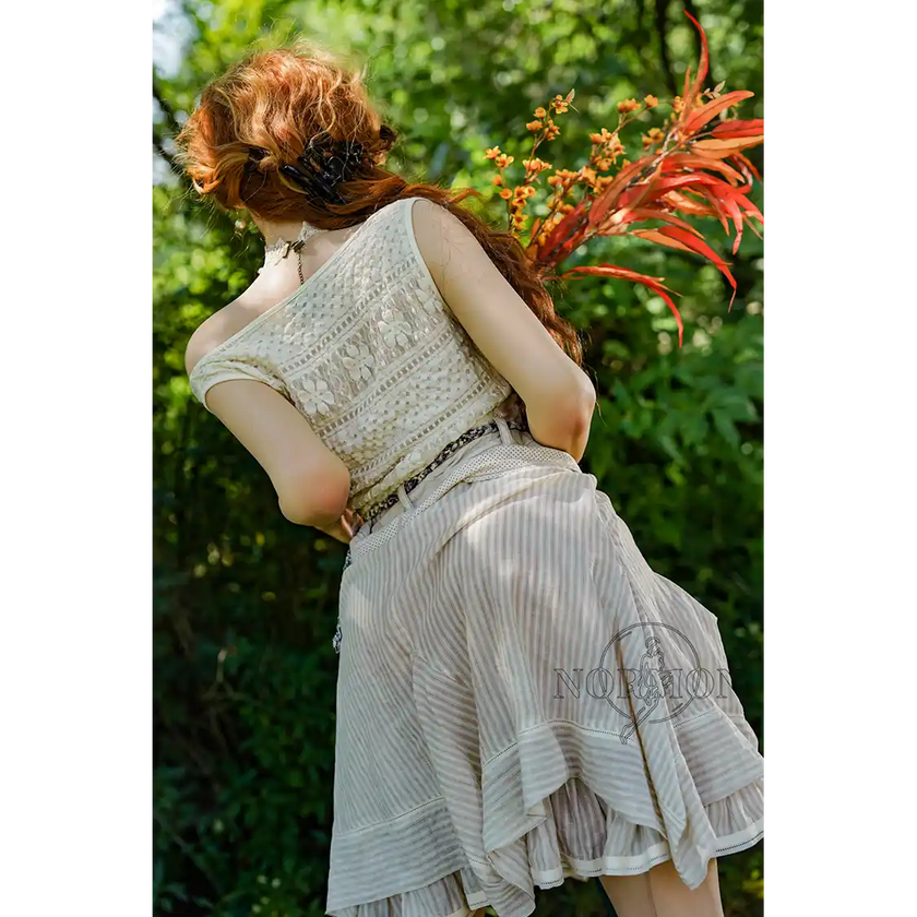 5ft 4in or 163cm tall life size hyper realistic MILF silicone sex doll with long legs, very large breasts and long wavy red hair with hazel eyes. Made by Normon Doll.