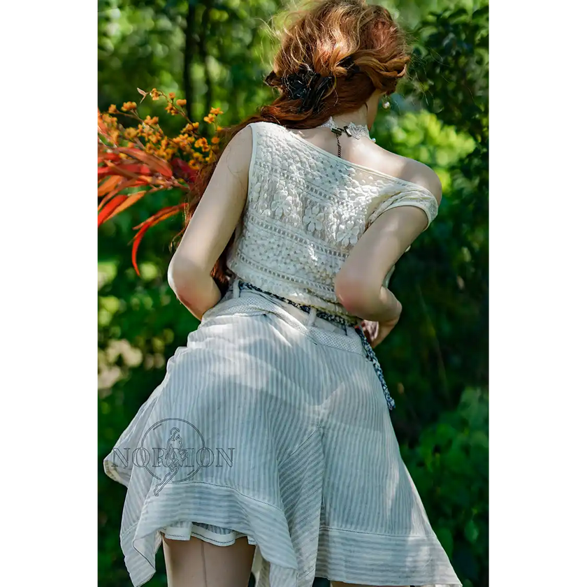 5ft 4in or 163cm tall life size hyper realistic MILF silicone sex doll with long legs, very large breasts and long wavy red hair with hazel eyes. Made by Normon Doll.