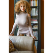 5ft 4in or 163cm tall life size hyper realistic MILF silicone sex doll with long legs, very large breasts and long curly blonde hair. Made by Normon Doll.