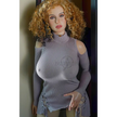 5ft 4in or 163cm tall life size hyper realistic MILF silicone sex doll with long legs, very large breasts and long curly blonde hair. Made by Normon Doll.