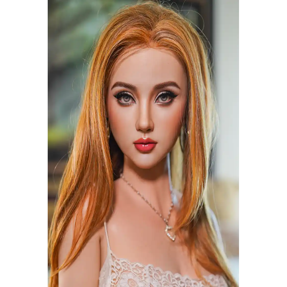 5ft 4in or 163cm tall life size hyper realistic silicone sex doll with long legs, very large breasts and long straight hair with hazel eyes. Made by Normon Doll.