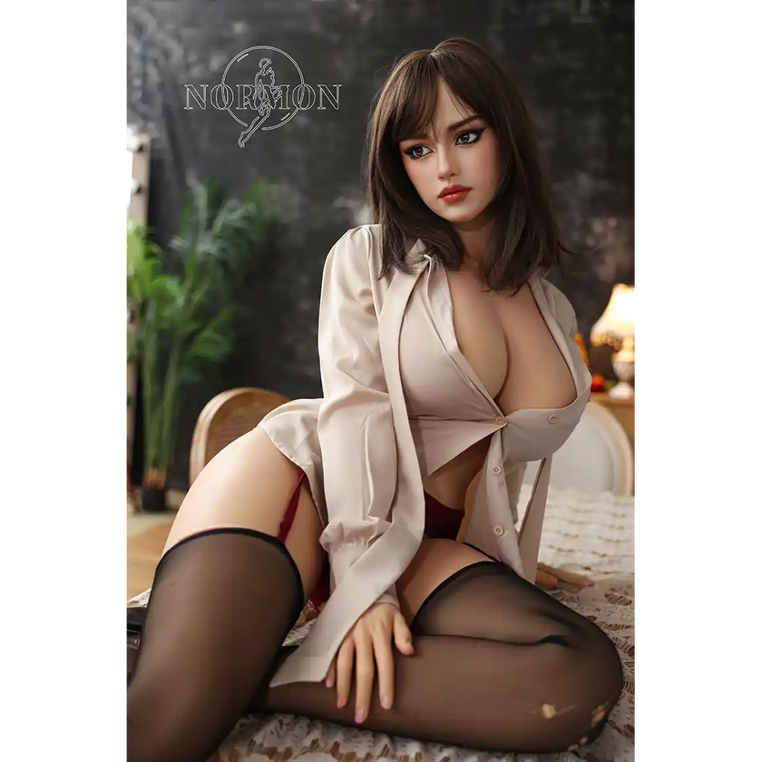 5ft 4in or 163cm tall life size hyper realistic silicone sex doll with long legs, very large breasts and medium length brown hair with brown eyes. Made by Normon Doll.