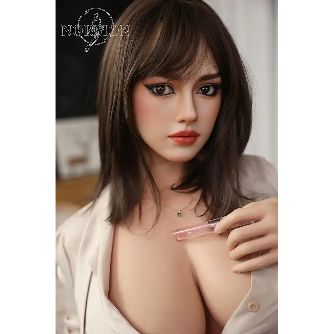 5ft 4in or 163cm tall life size hyper realistic silicone sex doll with long legs, very large breasts and medium length brown hair with brown eyes. Made by Normon Doll.