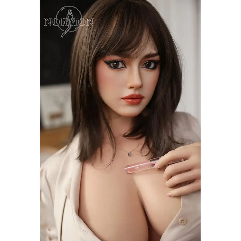 5ft 4in or 163cm tall life size hyper realistic silicone sex doll with long legs, very large breasts and medium length brown hair with brown eyes. Made by Normon Doll.
