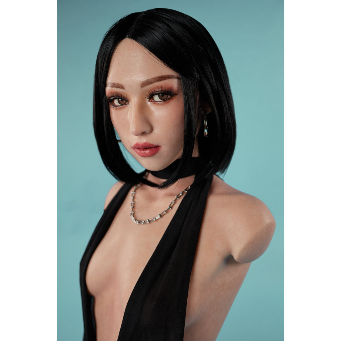 Climax Doll ULW 661 Miyoshi ultra lightweight silicone torso doll 3/4 view close up, in black dress.